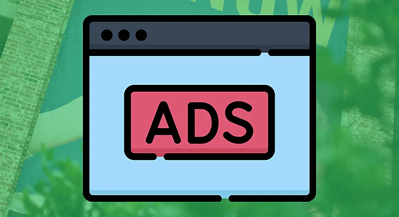 A graphic representation of an online display ad within a browser window. The browser is illustrated with a simplistic design, showing the outline of a tab and address bar on top. The main content area is a bold blue, with a large, red rectangle in the center labeled 'ADS' in capital white letters, simulating an advertisement banner. The background behind the browser is a blurred image of foliage and what appears to be a brick wall, suggesting the ad is viewed on a screen with a natural outdoor setting behind it. This image is likely used to symbolize the concept of digital advertising within an internet browsing context