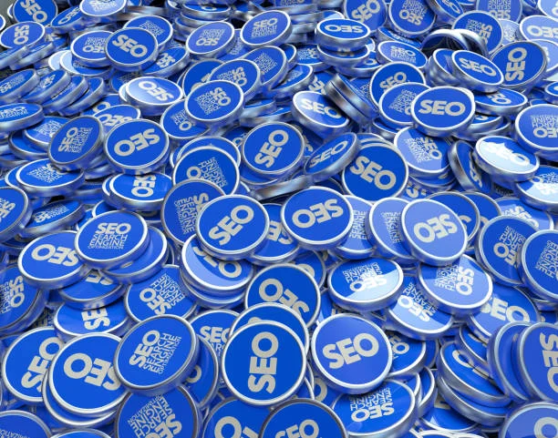 A sea of blue and white circular pins fills the image, each featuring the bold acronym 'SEO' in the center, signifying Search Engine Optimization. The repetition of the pins and the 'SEO' text creates a visual representation of the importance of SEO in digital strategy. This image metaphorically suggests that mastering SEO is a foundational element in adhering to content creation and compliance guidelines, particularly in the context of using AdSense to monetize content, as indicated by the theme 'Mastering AdSense: Essential Guidelines for Content Creation and Compliance