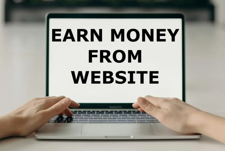 Photo of a person's hands typing on a laptop, with the screen prominently displaying the text 'EARN MONEY FROM WEBSITE' in bold, black letters on a white background. The image symbolizes the concept of making money online through website monetization, directly engaging with the topic of increasing income through digital platforms